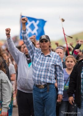 Man at Standing Rock protests. Photo by Tomas Alejo.