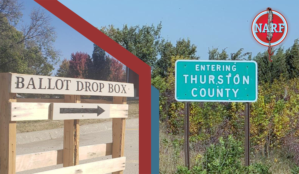 Photo of voting box next to Thurston County sign.