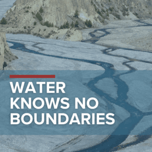 Text: Water Knows No Boundaries overlaid over photo of river with tributaries
