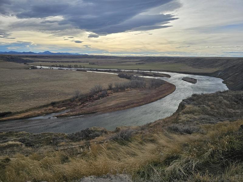 Photo of West Missouri River winding across landscape in Choteau County, Montana.